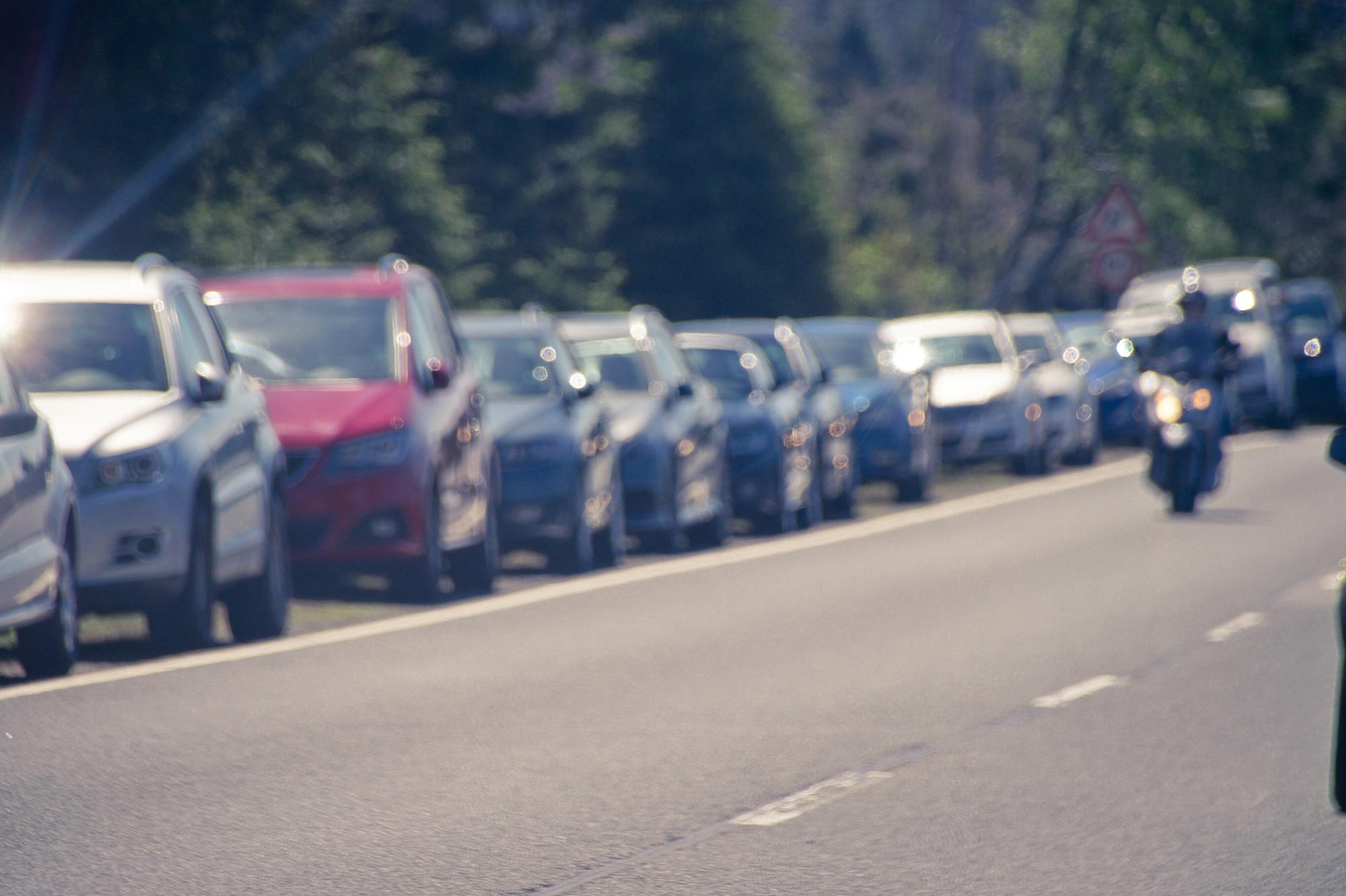 Vehicles following closely in congested traffic in Sacramento, California