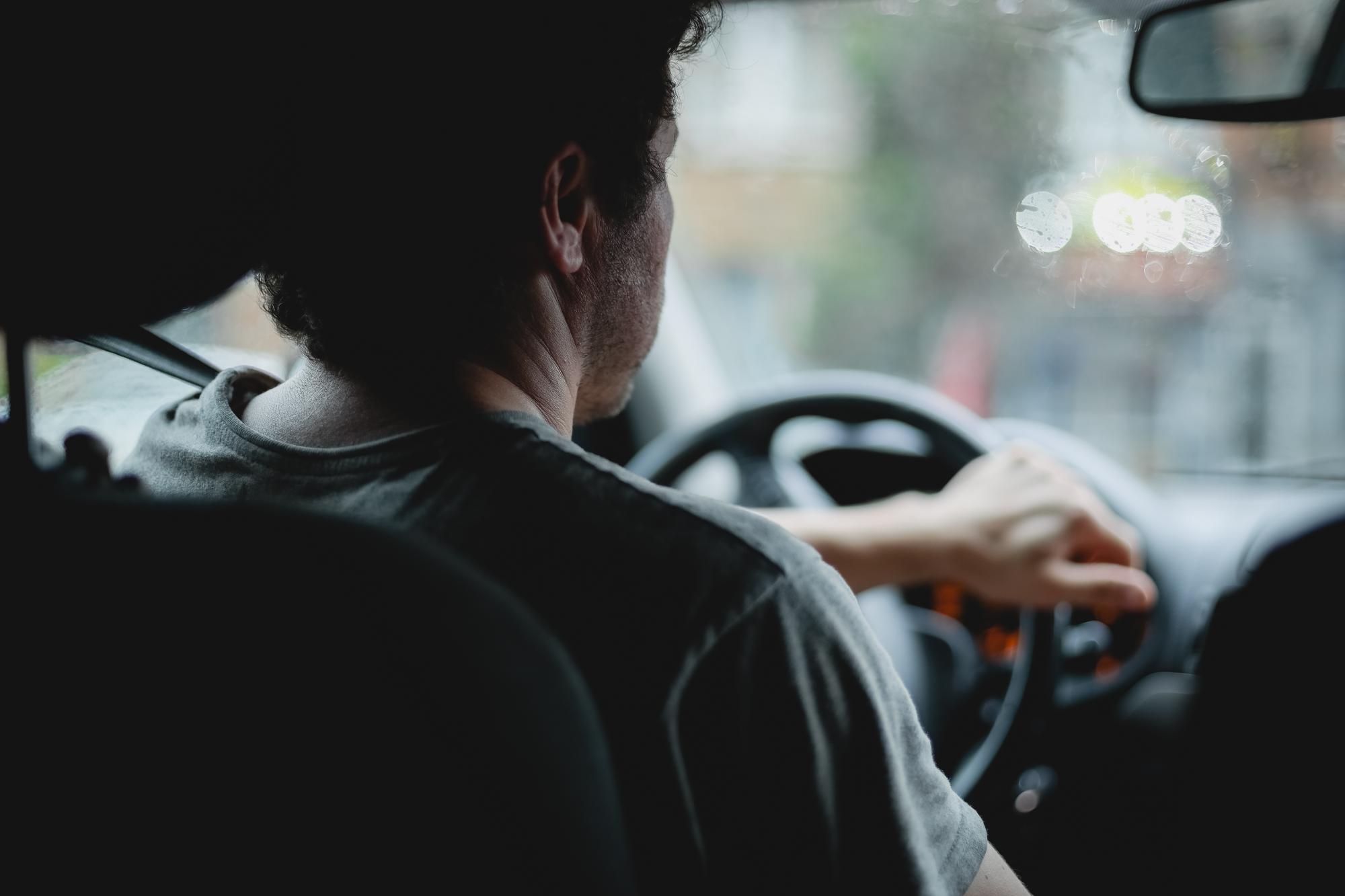 Driver looking away from the road while at the wheel in Sacramento, California
