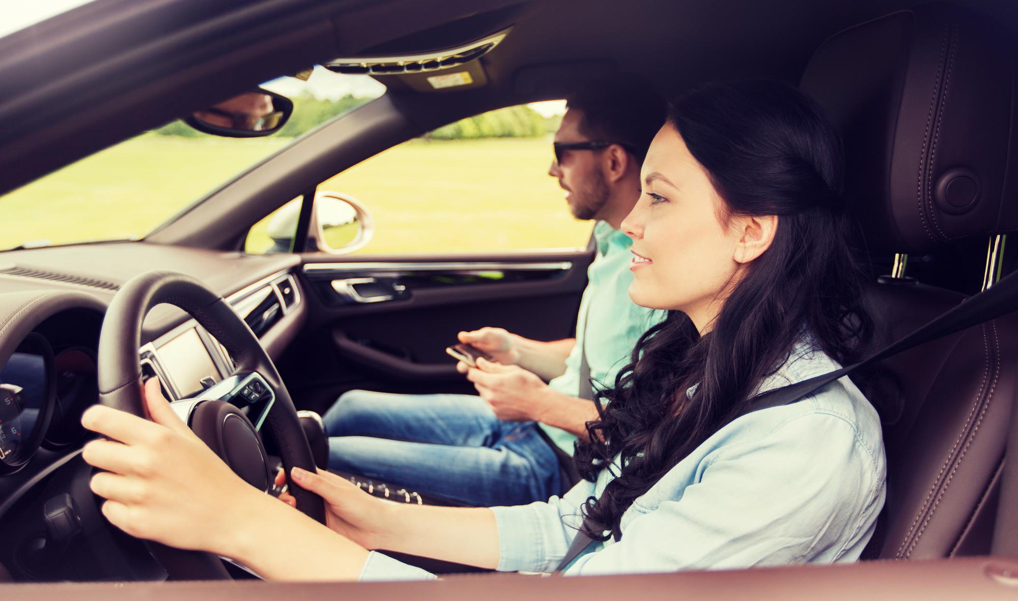 Driving instructor supervising a student driver in Sacramento, California