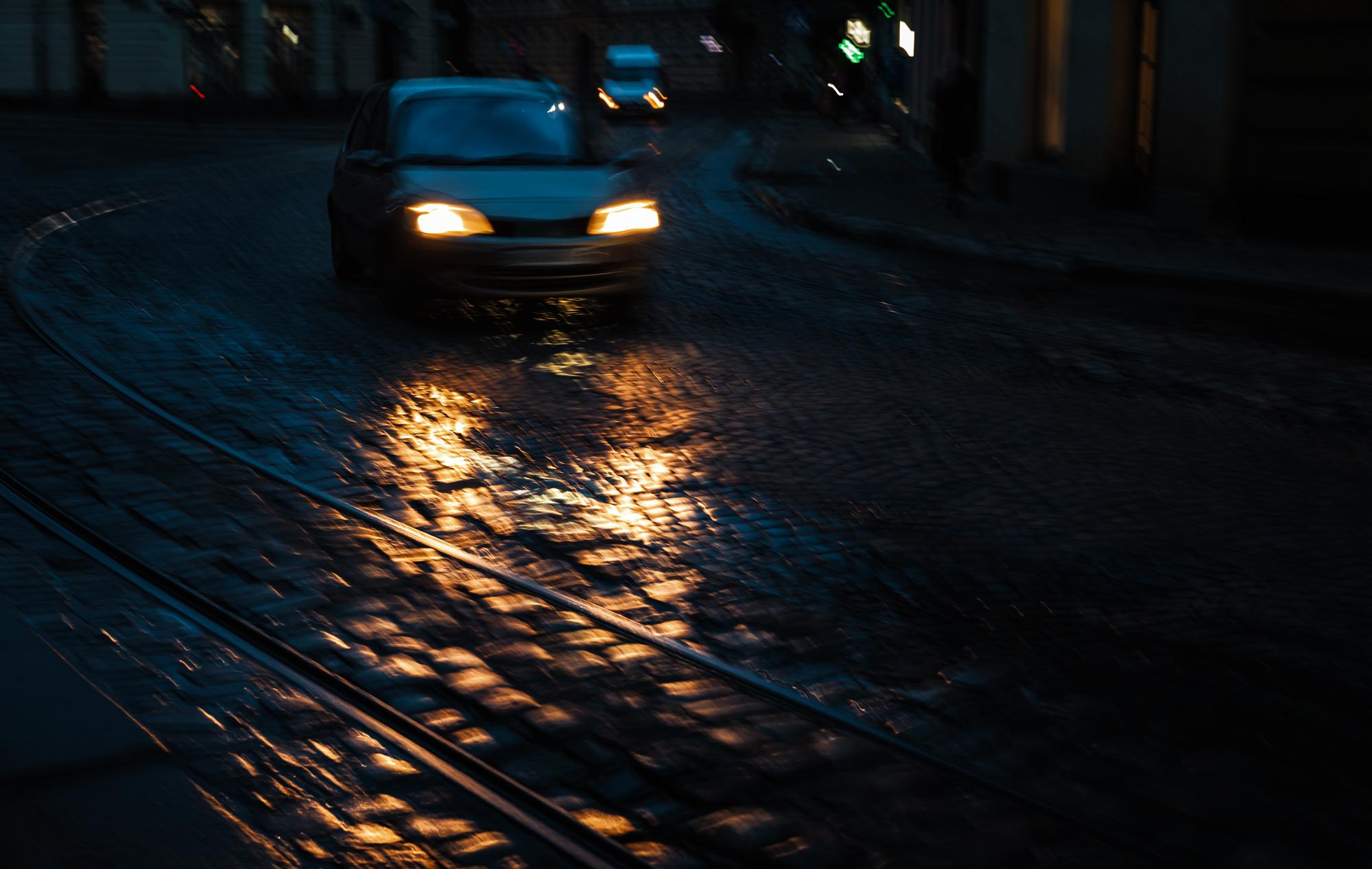 Vehicle driving through heavy rain and standing water in Sacramento, California
