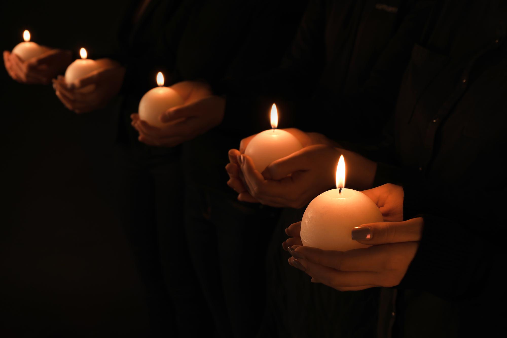 Memorial candles held in remembrance — Roseville wrongful death lawyers