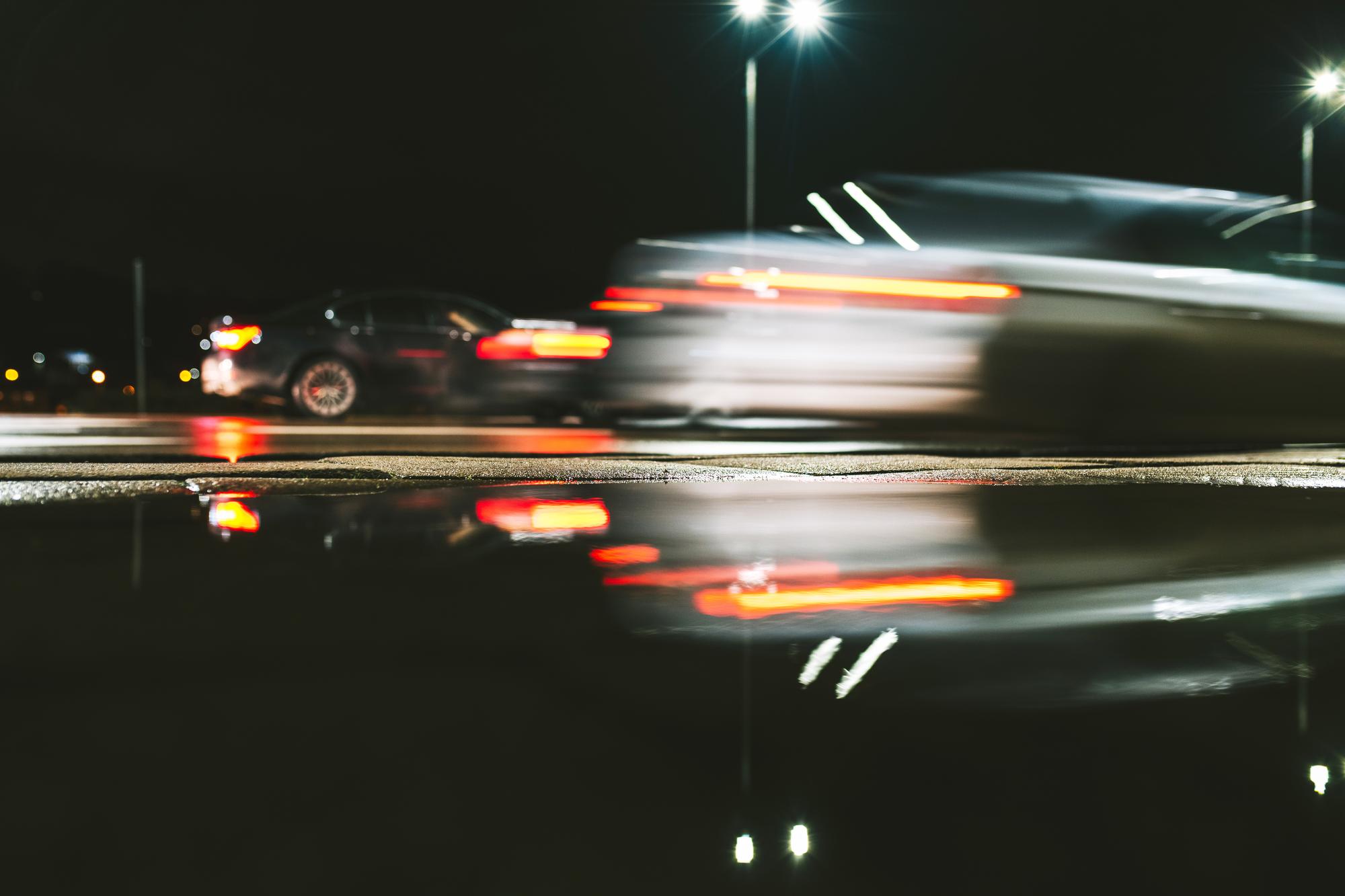 Speeding vehicle motion blur at night — Roseville speeding accident lawyers